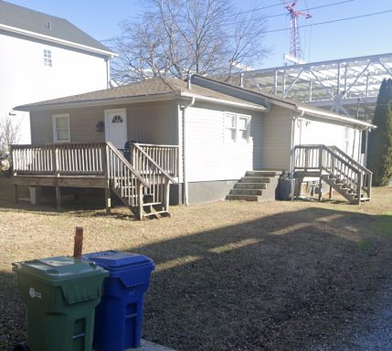 Rear Exterior – Before Renovation Rear exterior of home before renovation and outdoor improvements