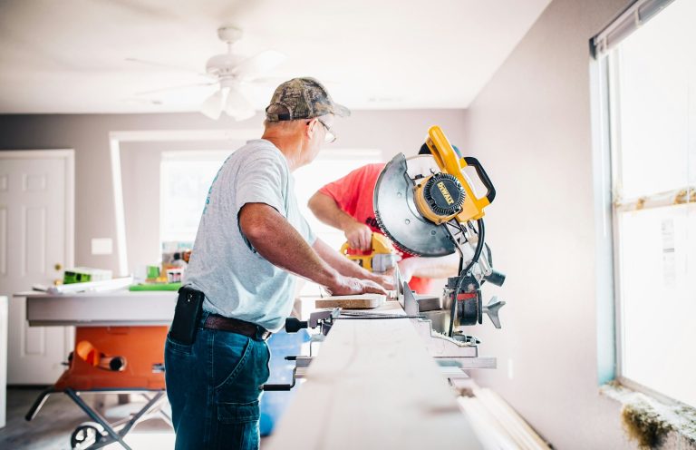 Residential home remodeling project with contractor performing interior renovation work